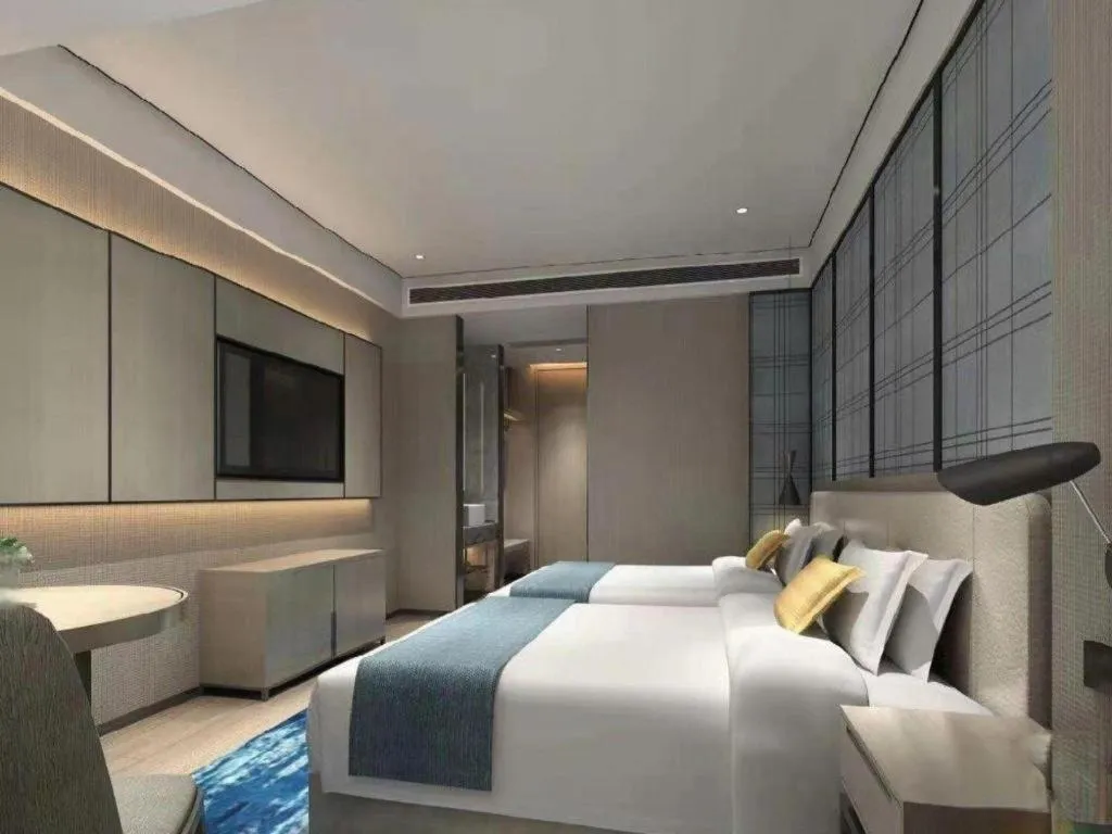 Bed in Echarm Hotel Shenzhen International Exhibition Center Fuyong