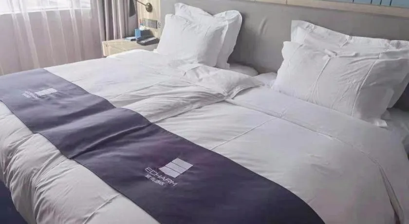 Bed in Echarm Hotel Shenzhen International Exhibition Center Fuyong