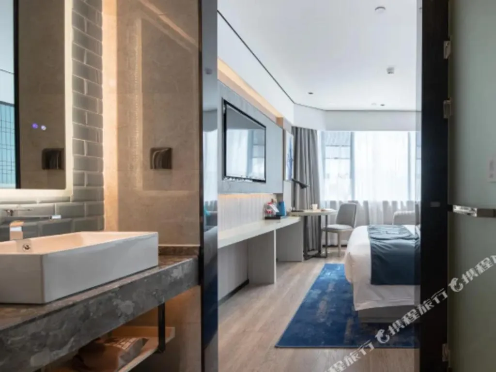 Bed in Echarm Hotel Shenzhen International Exhibition Center Fuyong