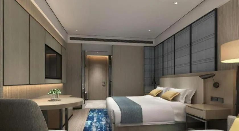 Bed in Echarm Hotel Shenzhen International Exhibition Center Fuyong