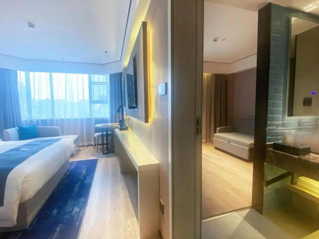 Bed in Echarm Hotel Shenzhen International Exhibition Center Fuyong