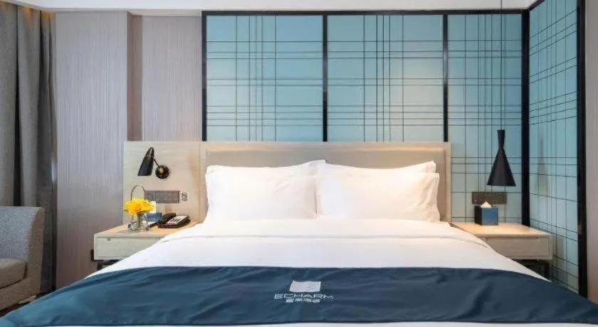 Bed in Echarm Hotel Shenzhen International Exhibition Center Fuyong