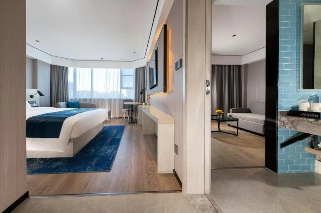 Bed in Echarm Hotel Shenzhen International Exhibition Center Fuyong