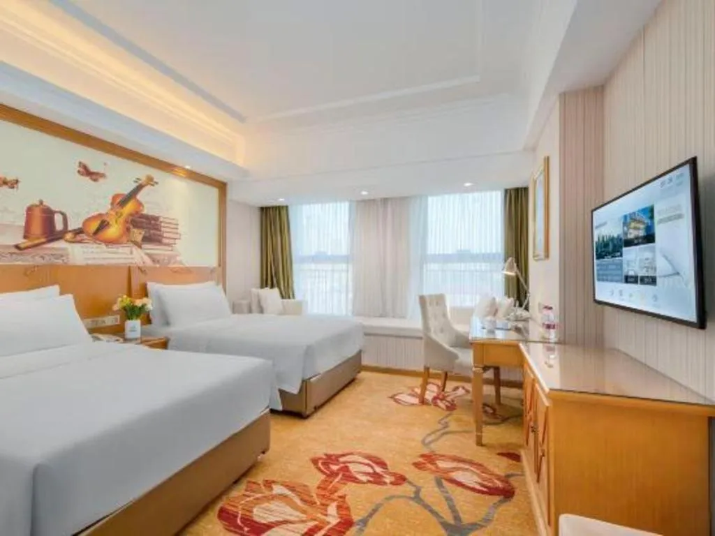 Bed in Vienna Hotel Zhengzhou Only Henan Movie Town