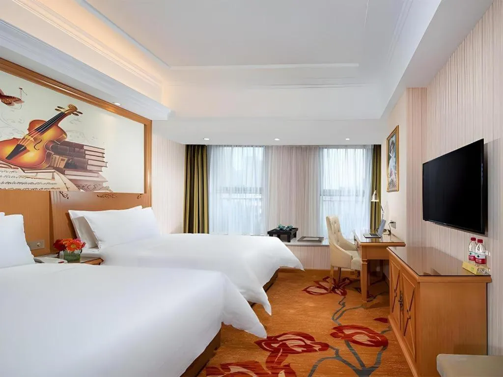 Bed in Vienna Hotel Zhengzhou Only Henan Movie Town