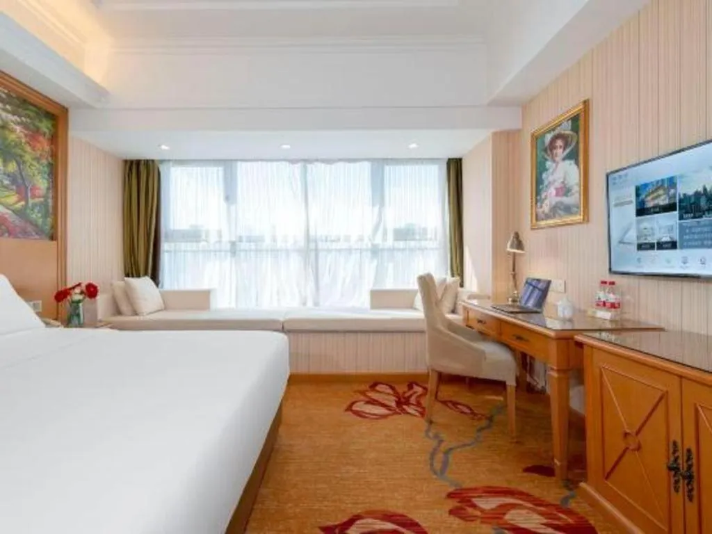 Bed in Vienna Hotel Zhengzhou Only Henan Movie Town