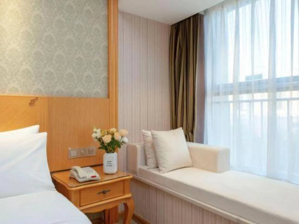 Bed in Vienna Hotel Zhengzhou Only Henan Movie Town