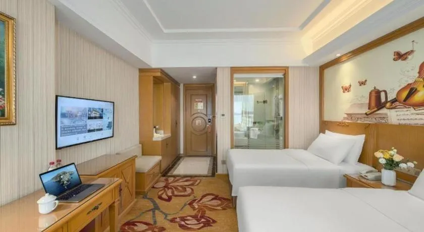 Bed in Vienna Hotel Zhengzhou Only Henan Movie Town