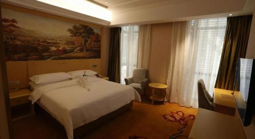 Bed in Vienna Hotel Hangzhou Jiubao Sijiqing Suanli Town
