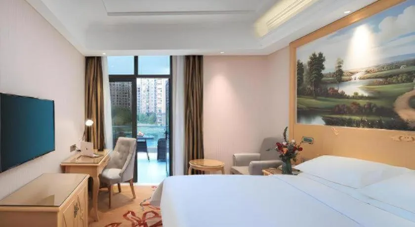 Bed in Vienna Hotel Hangzhou Jiubao Sijiqing Suanli Town