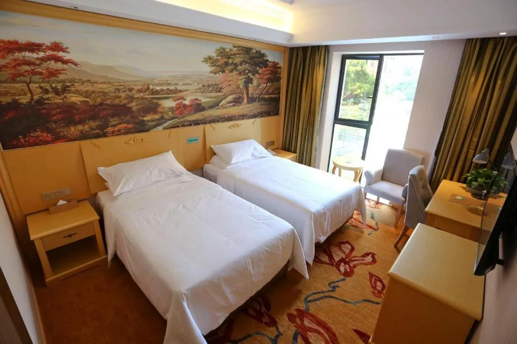 Bed in Vienna Hotel Hangzhou Jiubao Sijiqing Suanli Town