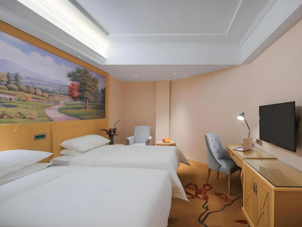 Bed in Vienna Hotel Hangzhou Jiubao Sijiqing Suanli Town