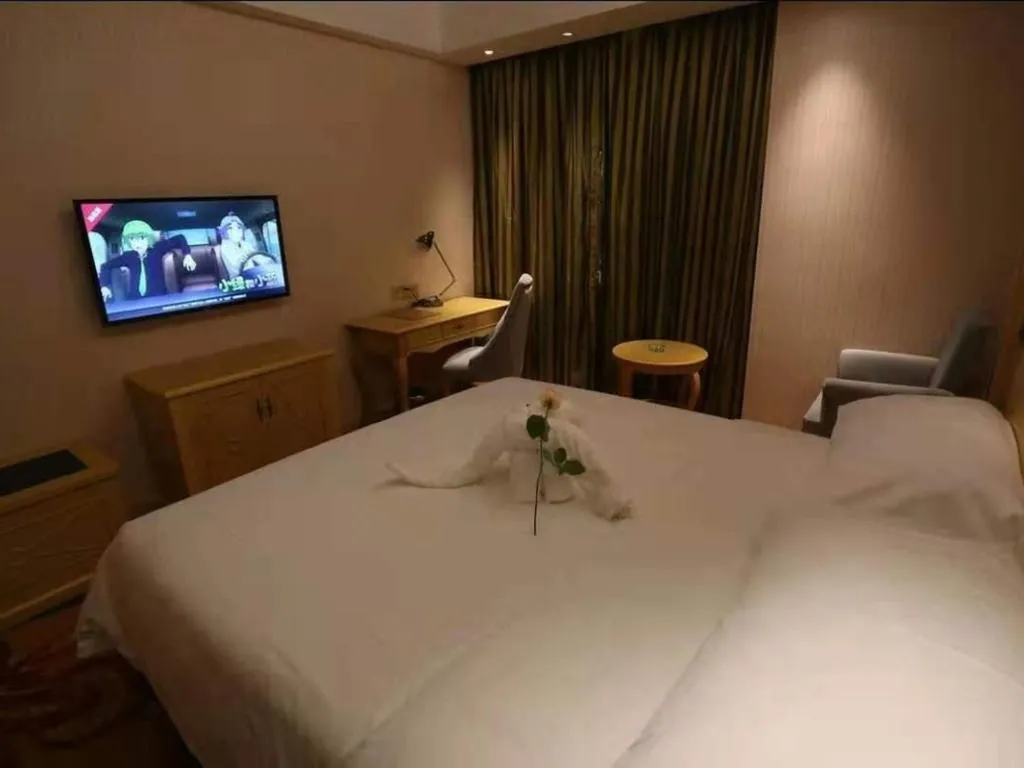 Bed in Vienna Hotel Hangzhou Jiubao Sijiqing Suanli Town