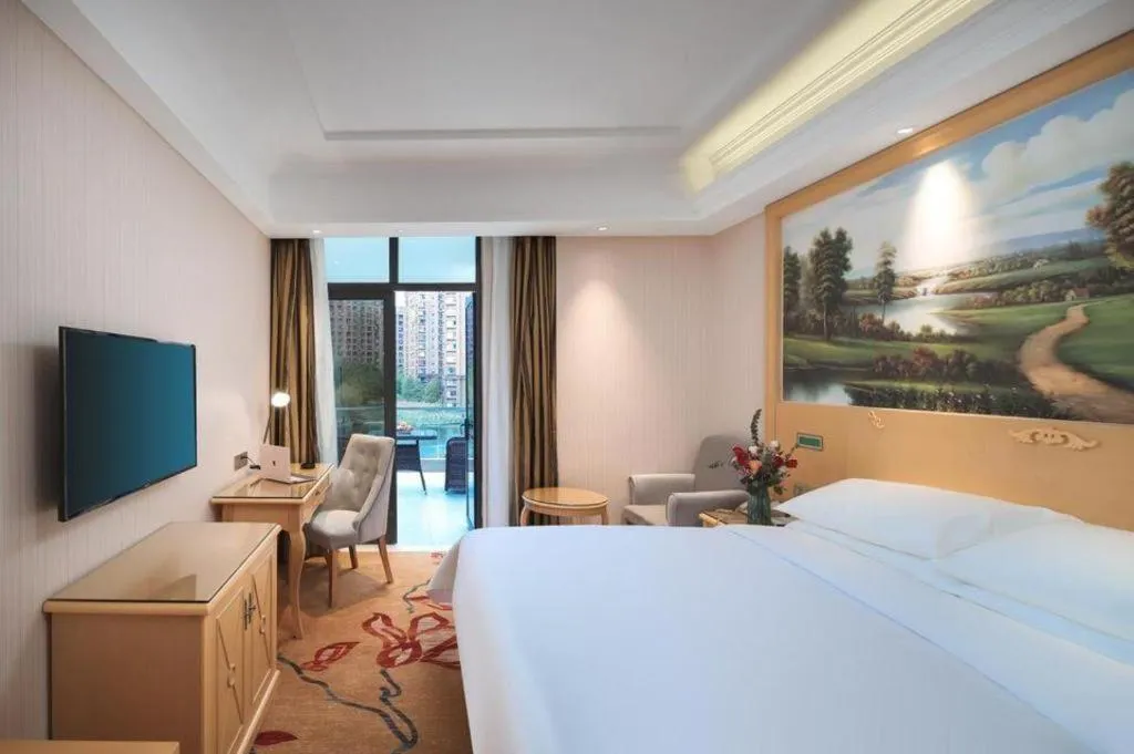 Bed in Vienna Hotel Hangzhou Jiubao Sijiqing Suanli Town