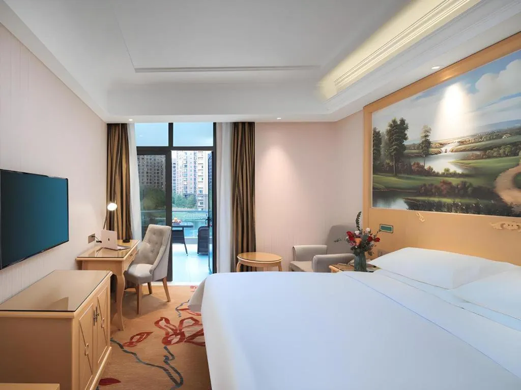 Bed in Vienna Hotel Hangzhou Jiubao Sijiqing Suanli Town