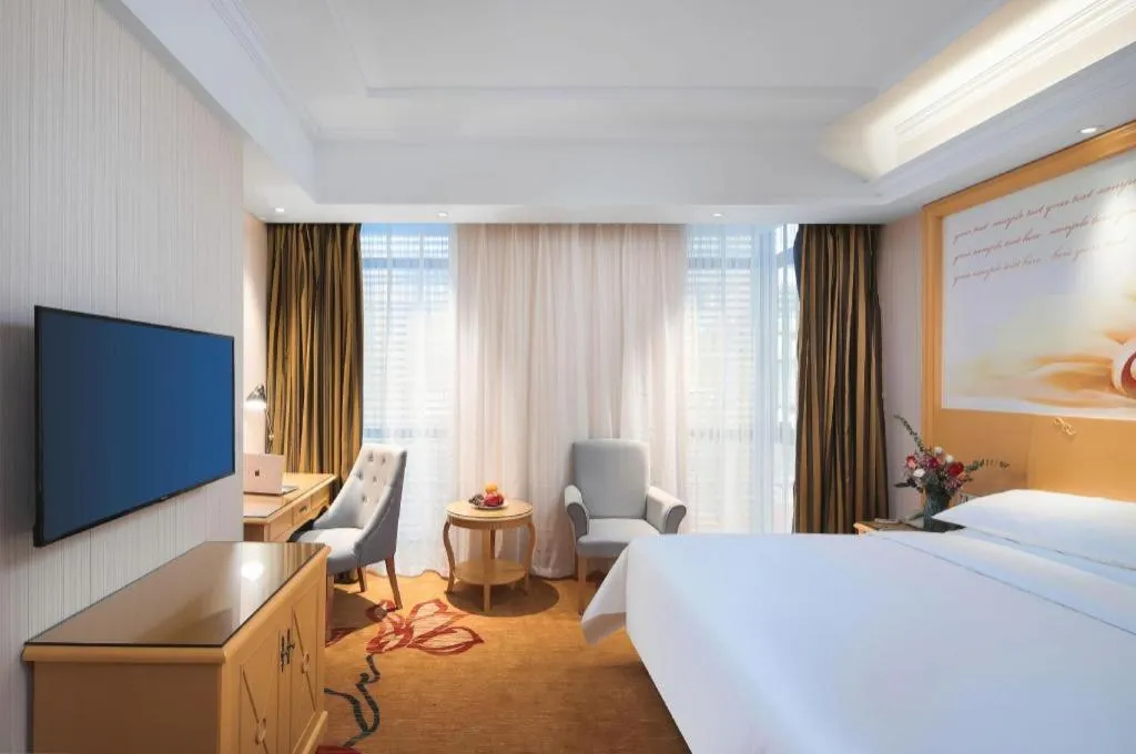 Bed in Vienna Hotel Hangzhou Jiubao Sijiqing Suanli Town