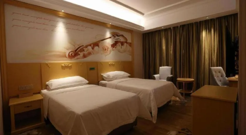 Bed in Vienna Hotel Hangzhou Jiubao Sijiqing Suanli Town