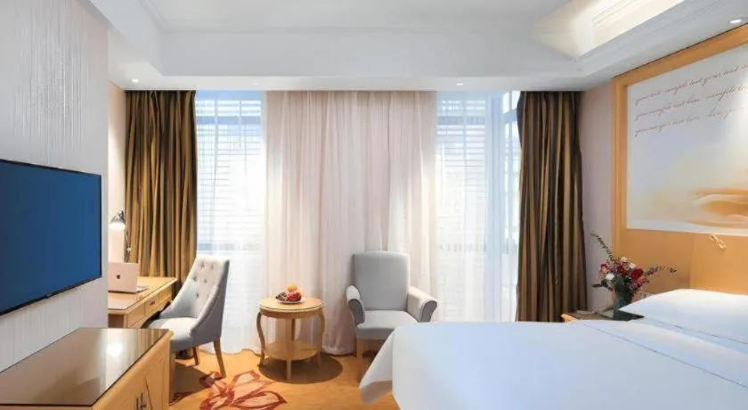 Bed in Vienna Hotel Hangzhou Jiubao Sijiqing Suanli Town