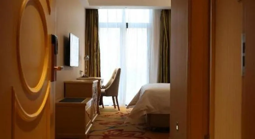 Bed in Vienna Hotel Hangzhou Jiubao Sijiqing Suanli Town