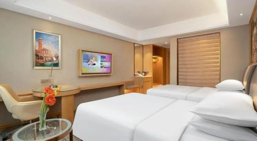 Bed in Vienna Hotel Guangzhou Yonghe Development Zone