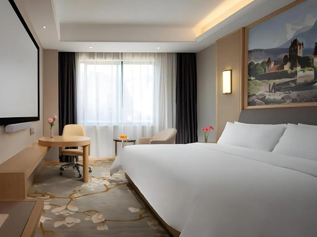 Bed in Vienna Hotel Guangzhou Yonghe Development Zone