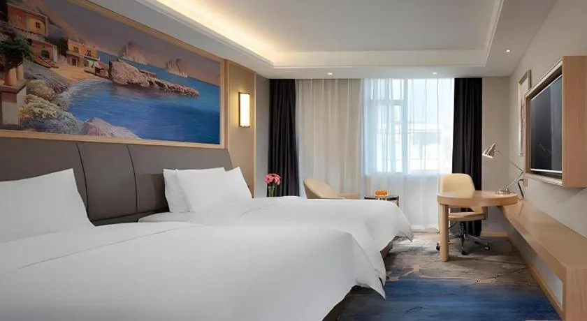 Bed in Vienna Hotel Guangzhou Yonghe Development Zone