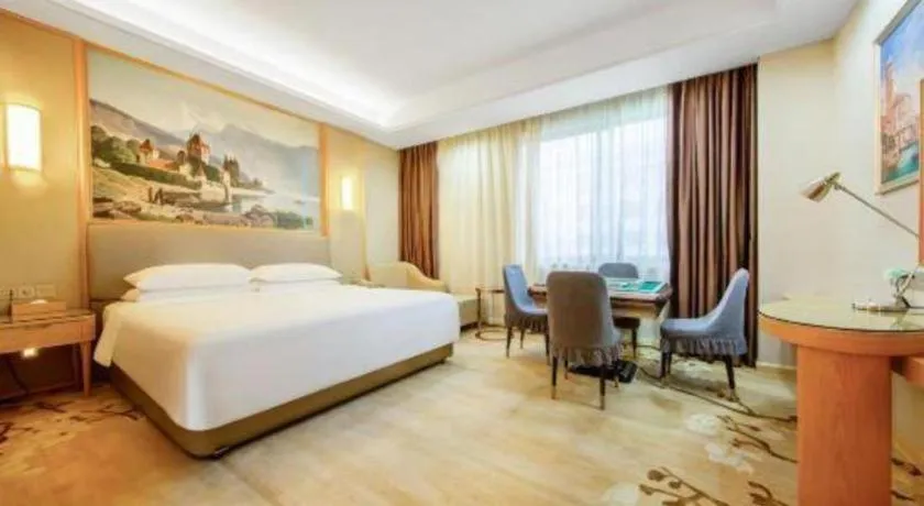 Bed in Vienna Hotel Guangzhou Yonghe Development Zone