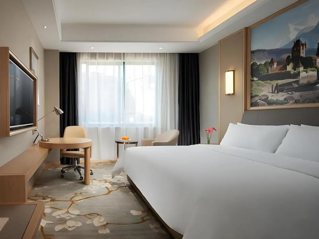 Bed in Vienna Hotel Guangzhou Yonghe Development Zone