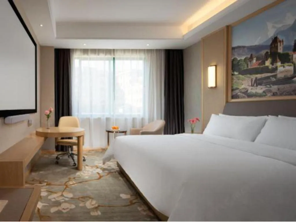 Bed in Vienna Hotel Guangzhou Yonghe Development Zone