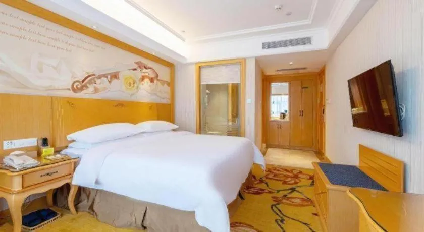 Bed in Vienna Hotel Shenzhen Qinghu Metro Station
