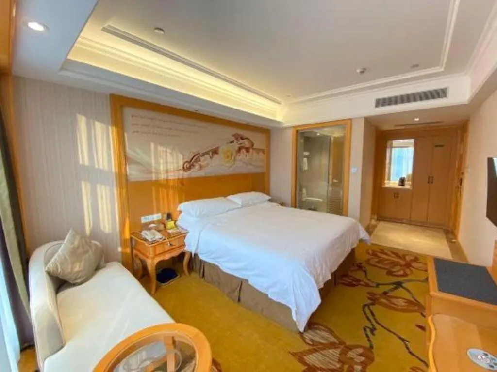 Bed in Vienna Hotel Shenzhen Qinghu Metro Station