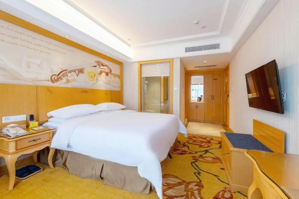 Bed in Vienna Hotel Shenzhen Qinghu Metro Station