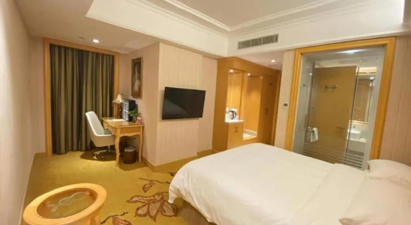 Bed in Vienna Hotel Shenzhen Qinghu Metro Station