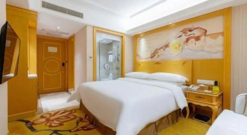 Bed in Vienna Hotel Shenzhen Qinghu Metro Station