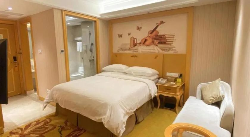 Bed in Vienna Hotel Shenzhen Qinghu Metro Station
