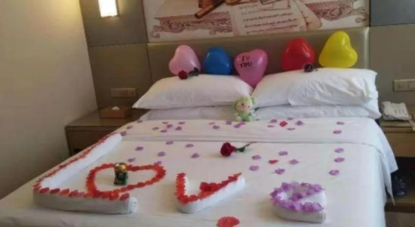 Bed in Vienna Hotel Shenzhen Guanlan Shanshuitianyuan Xintian