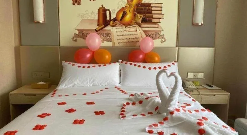 Bed in Vienna Hotel Chengdu Xinjin Old Pier Liujianian Metro Station