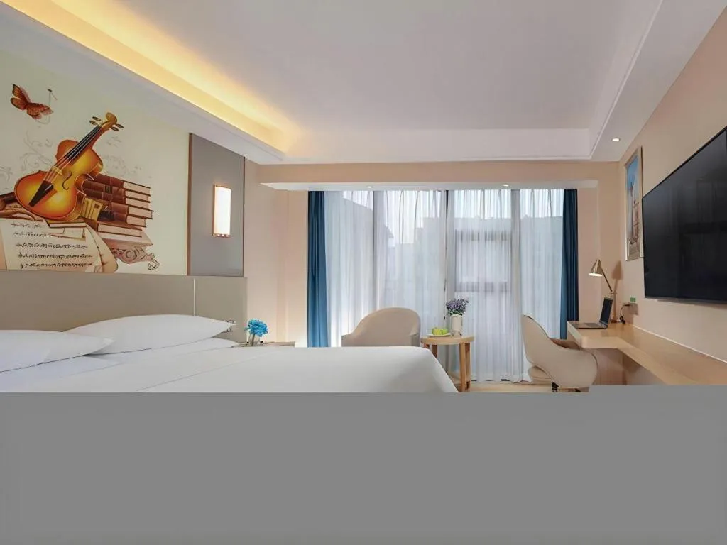 Bed in Vienna Hotel Chengdu Xinjin Old Pier Liujianian Metro Station