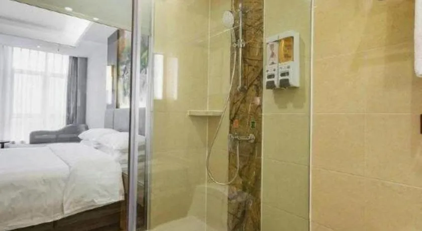 Bed in Vienna Hotel Chengdu Xinjin Old Pier Liujianian Metro Station