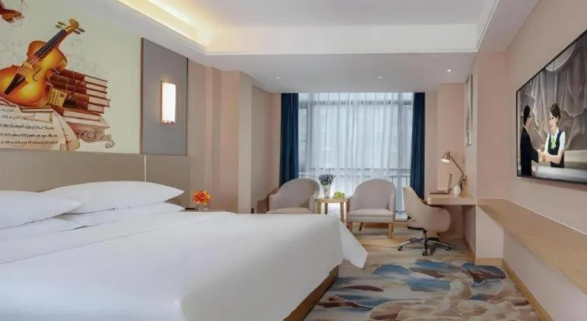 Bed in Vienna Hotel Chengdu Xinjin Old Pier Liujianian Metro Station