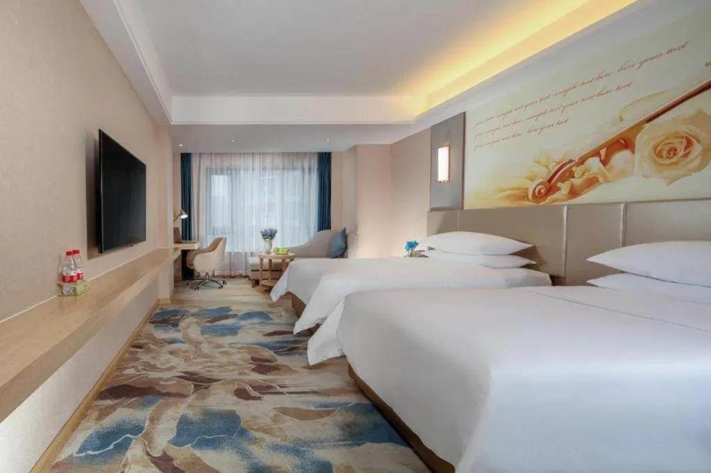 Bed in Vienna Hotel Chengdu Xinjin Old Pier Liujianian Metro Station