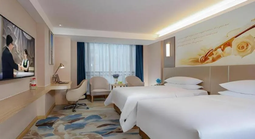 Bed in Vienna Hotel Chengdu Xinjin Old Pier Liujianian Metro Station