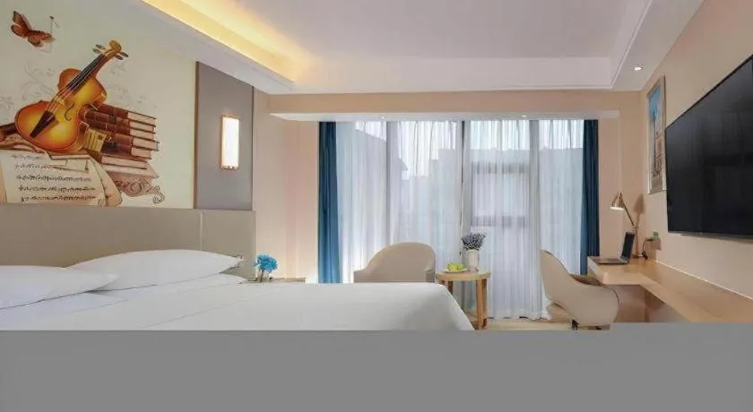 Bed in Vienna Hotel Chengdu Xinjin Old Pier Liujianian Metro Station