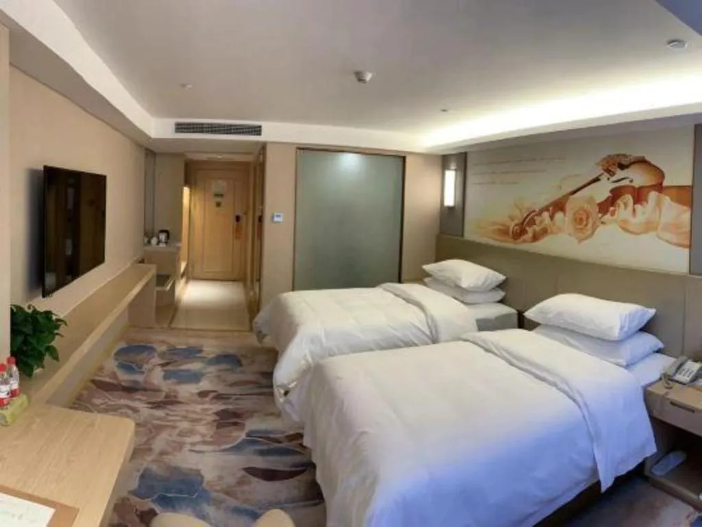 Bed in Vienna Hotel Chengdu Xinjin Old Pier Liujianian Metro Station