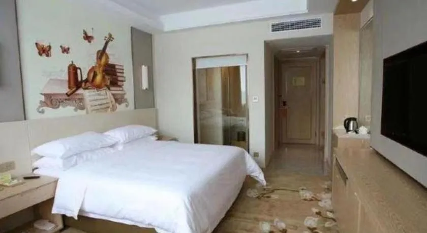 Bed in Vienna Hotel Chengdu Xinjin Old Pier Liujianian Metro Station