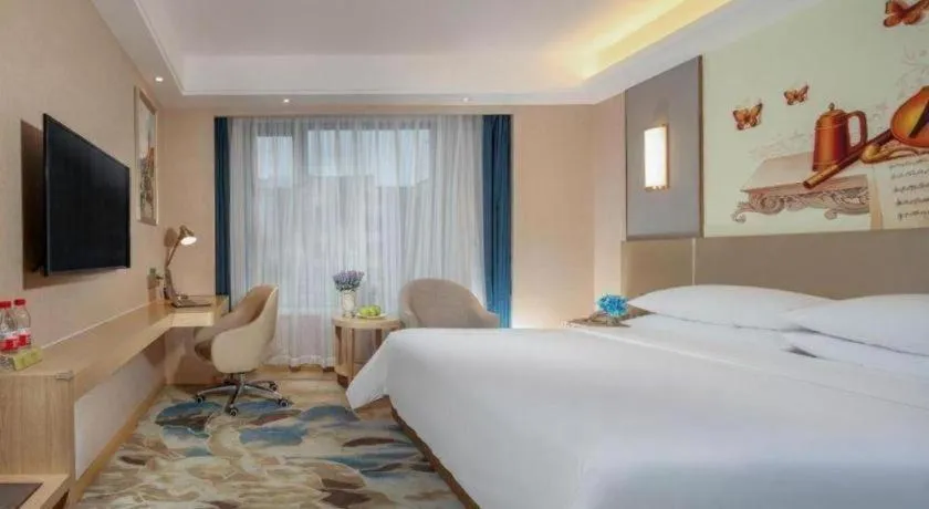 Bed in Vienna Hotel Chengdu Xinjin Old Pier Liujianian Metro Station