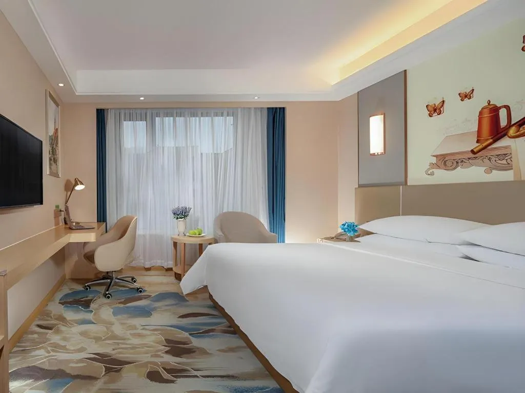 Bed in Vienna Hotel Chengdu Xinjin Old Pier Liujianian Metro Station