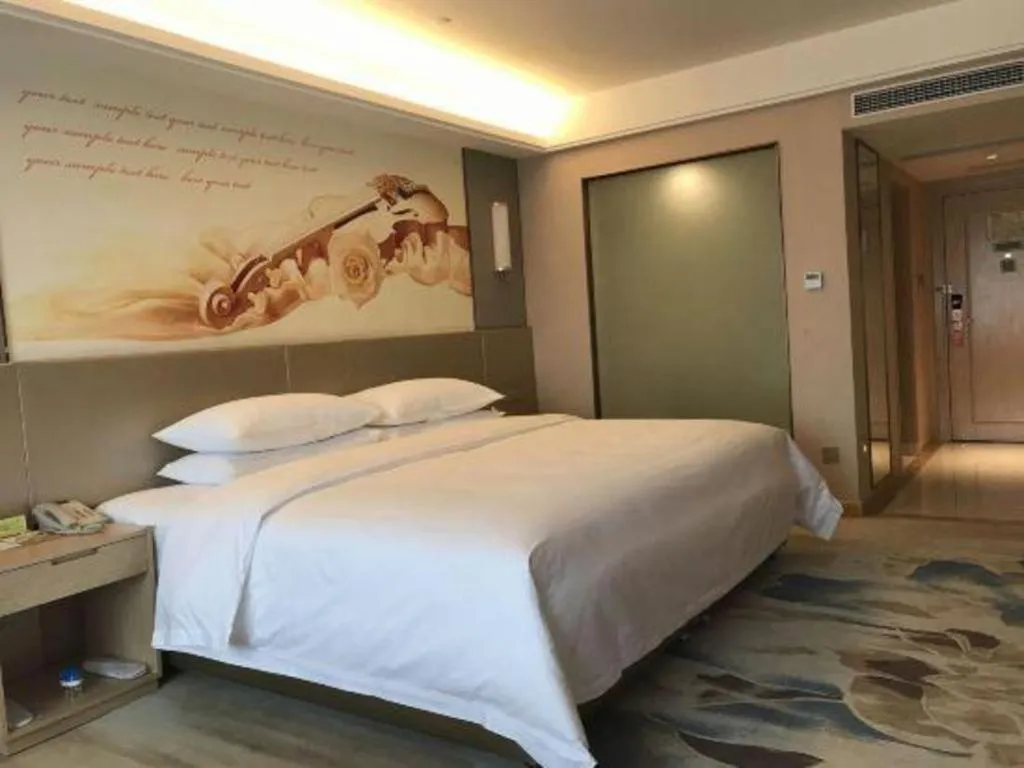 Bed in Vienna Hotel Chengdu Xinjin Old Pier Liujianian Metro Station