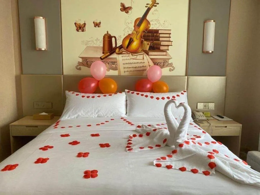 Bed in Vienna Hotel Chengdu Xinjin Old Pier Liujianian Metro Station