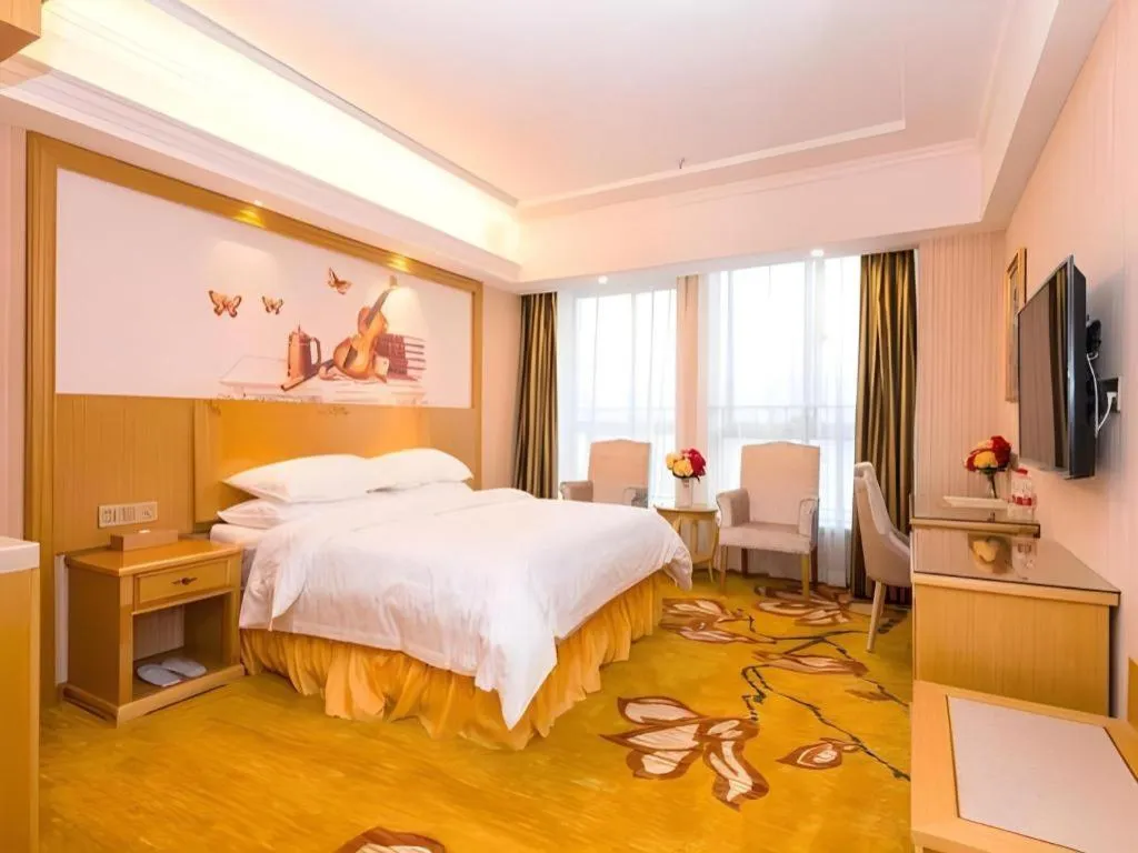 Bed in Vienna Hotel Wuhan Huazhong Normal University Huquan Metro Station